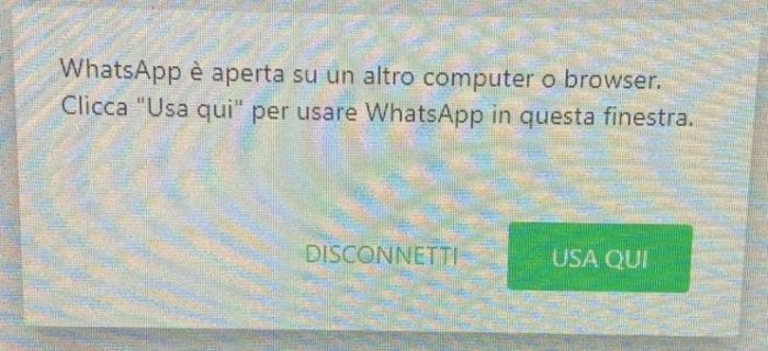 Schermata di avviso di WhatsApp Web aperto su un altro dispositivo